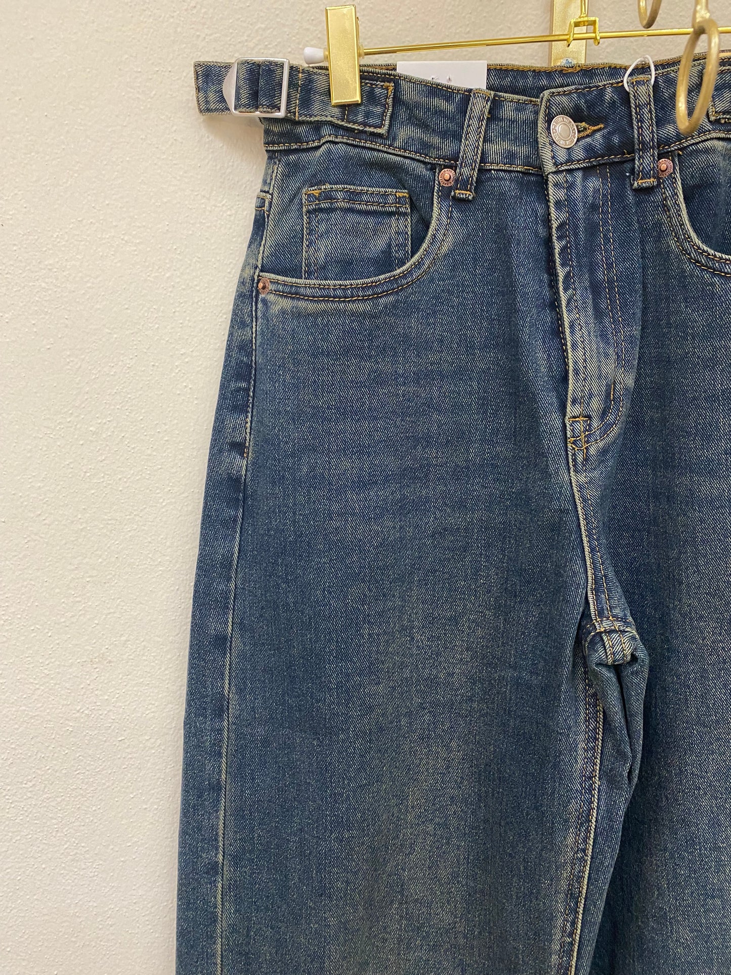 Jeans piegone sabbiato