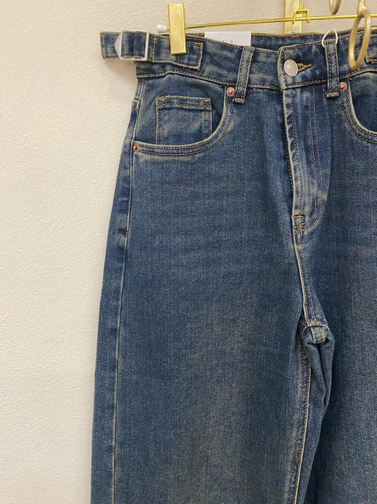 Jeans piegone sabbiato